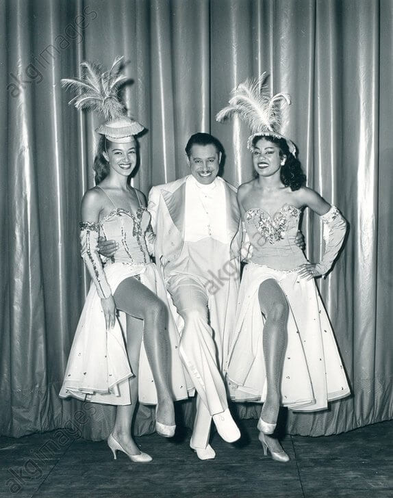 1957 0701 CAb Calloway and 2 dancers Cotton Club Revue by Abbie Rowe.jpg