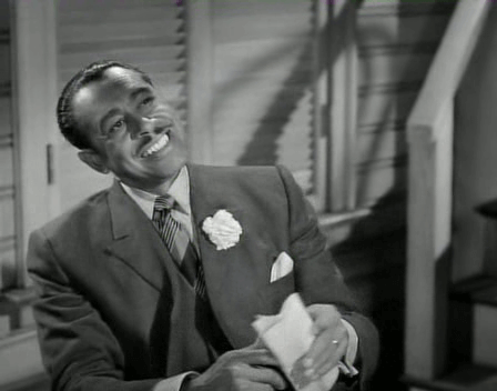 28A St Louis Blues 1958 Cab Calloway as Blade grins.png